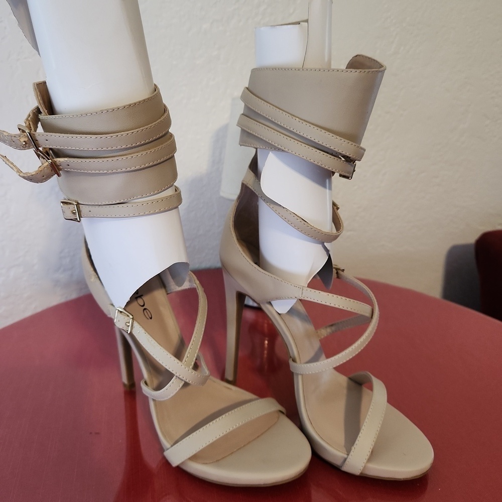 Bebe beige high heels size 6